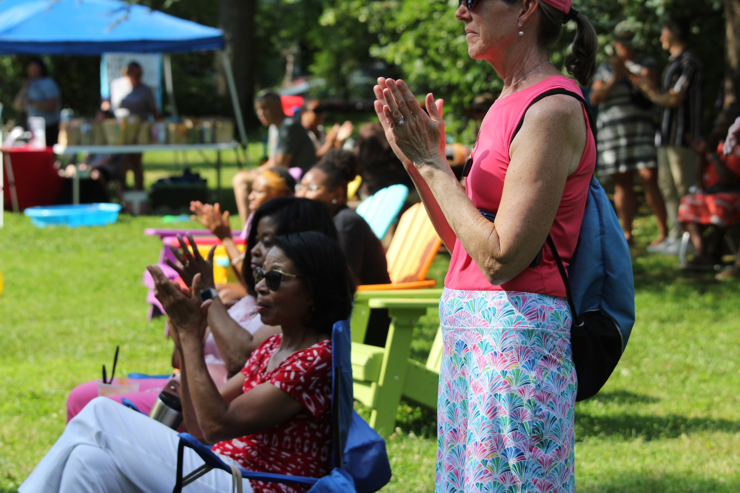Audience in chairs watching performance