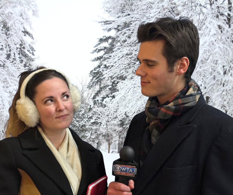 Two actors performing their roles for groundhog day the musical in front of a snowy forest