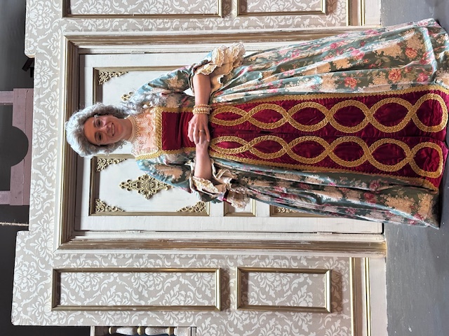 Actress posing for the camera during dress rehearsal