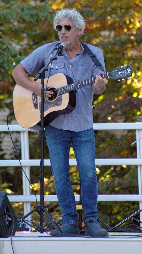 Man performing on stage perkins center