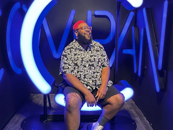 Man sitting on a stage