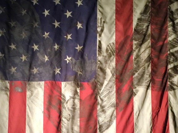 American flag with burn marks