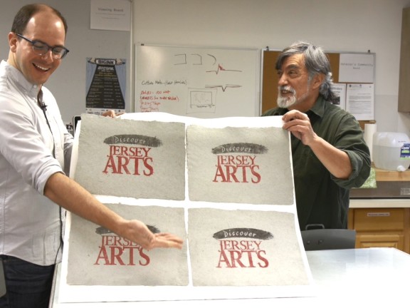 JerseyArts header featuring paper art with the old Discover Jersey Arts logo