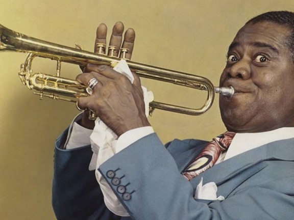 Louis Armstrong playing the trumpet
