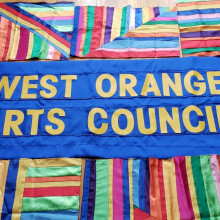 West Orange Arts Council Banner in many colors