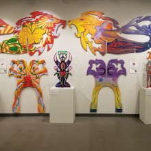 Painted wooden art inside a gallery