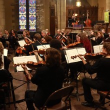 Musicians from the New Jersey Intergenerational Orchestra perform