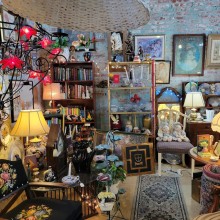 Interior of arts emporium showcasing antiques and artworks