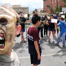 A group of young people working on a film production