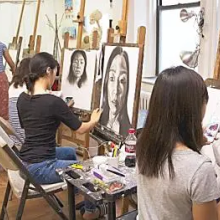A group of young people in a drawing class