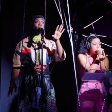 a musical duo performing onstage