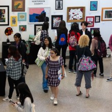 A group of students in a gallery as part of the Hunterdon County Teen Arts Festival