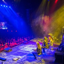 Band performing from the stage at bergenPAC