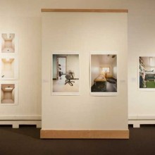A group of photographs on display in an art gallery.
