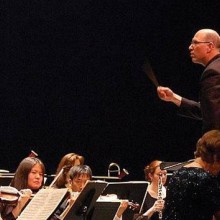 Jed Galin, Music Director for Bay Atlantic Symphony, conducting the orchestra.