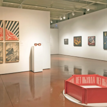 A gallery with artwork on the walls.