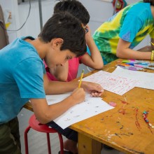 Kids working on an art project at the LBIF Summer Camp