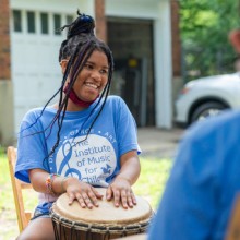 Students playing drums.