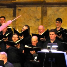 Princeton Princeton Pro Musica performing with their conductor in a concert hall