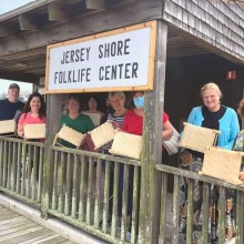 Group of people in front of the Jersey Shore Folklife Center.