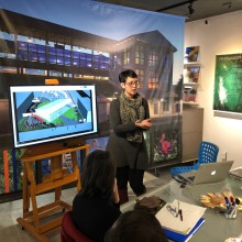 A woman conducting a meeting