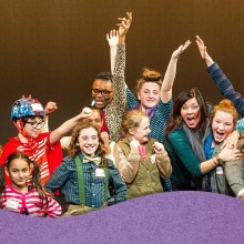 group photo of children participating in a theatre class at McCarter Theatre