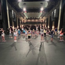 Performing Arts School students performing on stage