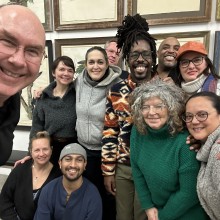 A multiracial group of 11 people standing together at the 2023 Individual Artist Fellowship Grantee gathering hosted by JCAC