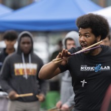 Mobile Music Lab drum circle facilitators engage participants at Jersey Surf-produced  drum circle event.