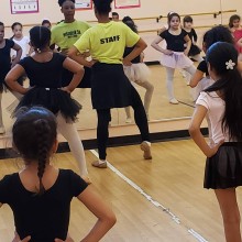 dance students practice in front of a mirror