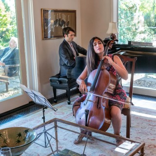 a cellist and pianist performing together
