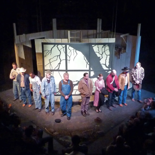 The cast of a play on stage at Hudson Theatre Works in the black box theater