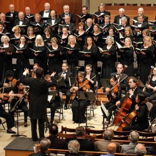 ProArte Chorale performing in a concert hall