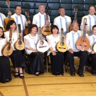 A group photo of members of the University of the Philippines Alumni & Friends Rondalla