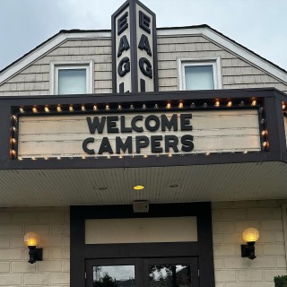 Eagle Theatre marquee that reads “Welcome Campers”