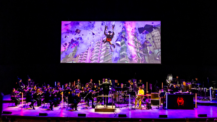 Spider-Man Across the Spider-Verse on screen with an orchestra