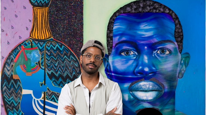 Devan Shimoyama standing in front of artwork from SHIFT exhibit