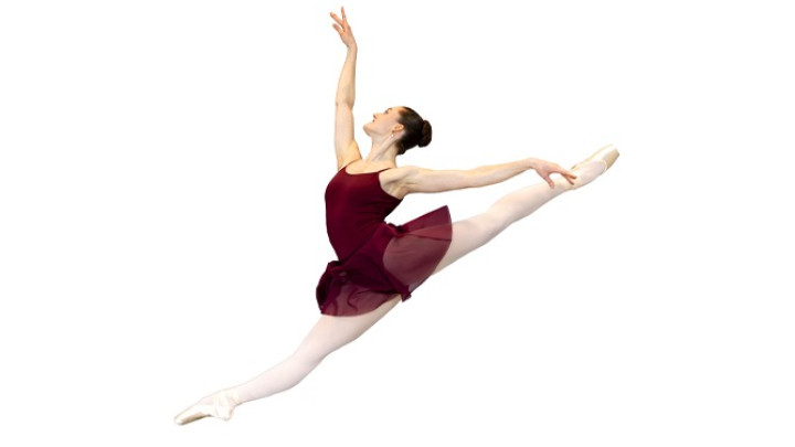Ballet dancer in red jumping