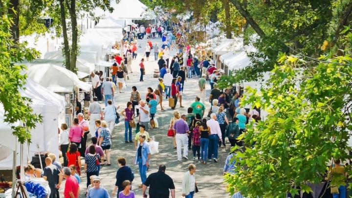 People walking through festival