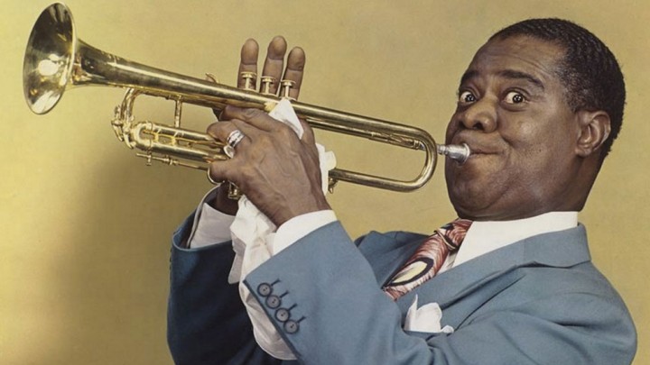 Louis Armstrong playing the trumpet