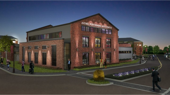 a rendering of an exterior image of the large brick building with a white sign that says “The Avenel Performing Arts Center