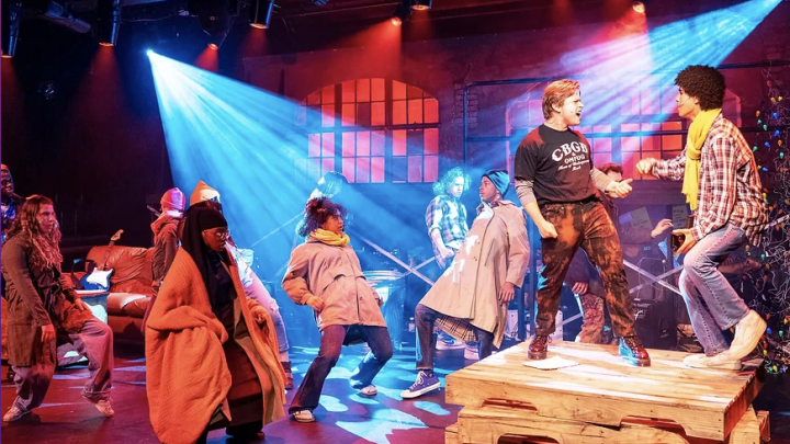 Actors onstage peforming at Vanguard Theater Company