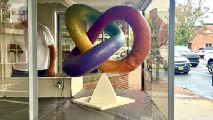 Sculpture in Toms River Artist Community window.